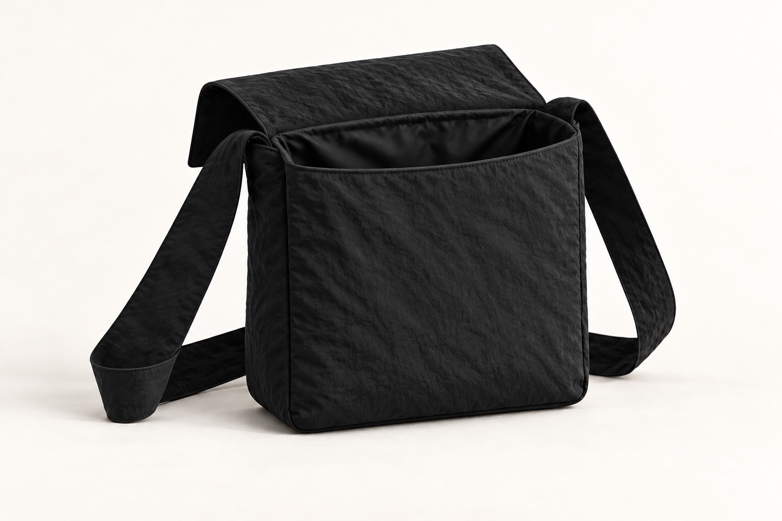 Open square fold concept showing the soft nylon-lined main compartment.