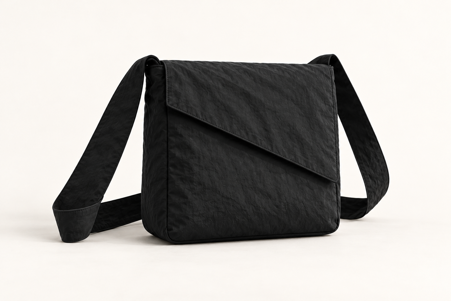 Monofloat square fold bag concept in black, shown as a standalone product study.